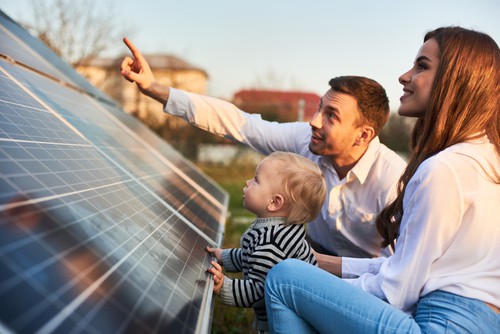 Man Shows His Family The Solar Panels On The Plot