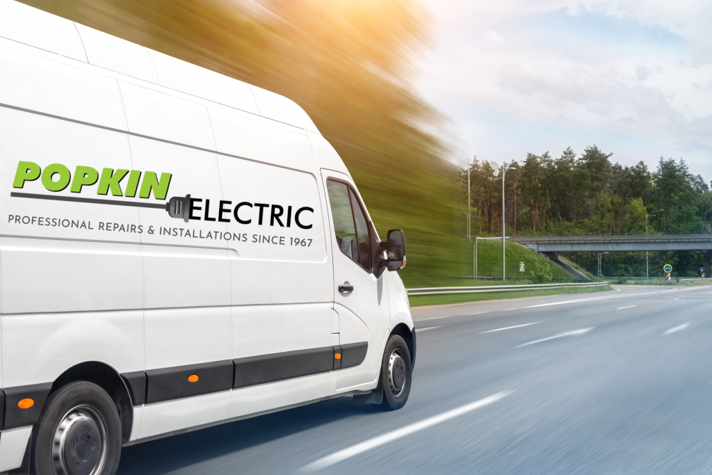 popkin electric truck driving on a highway.