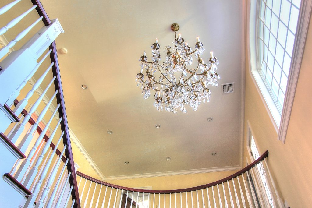 chandelier with chandelier lift installed in a residential home.