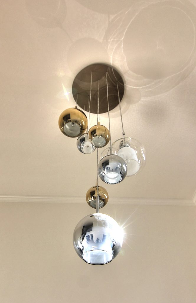 modern hall pendant installed in a residential home.