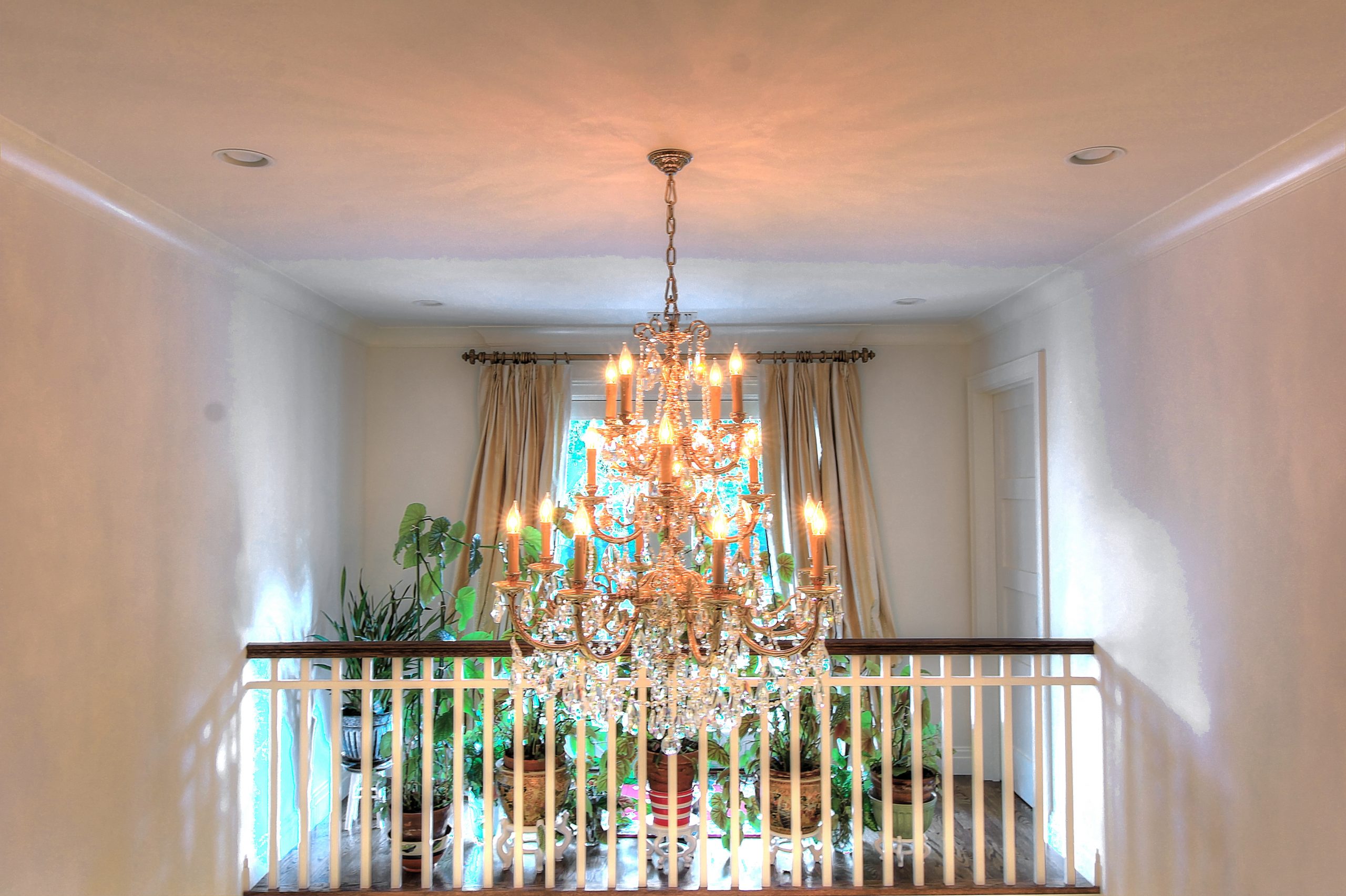 traditional chandelier with chandelier lift installed in a residential home.